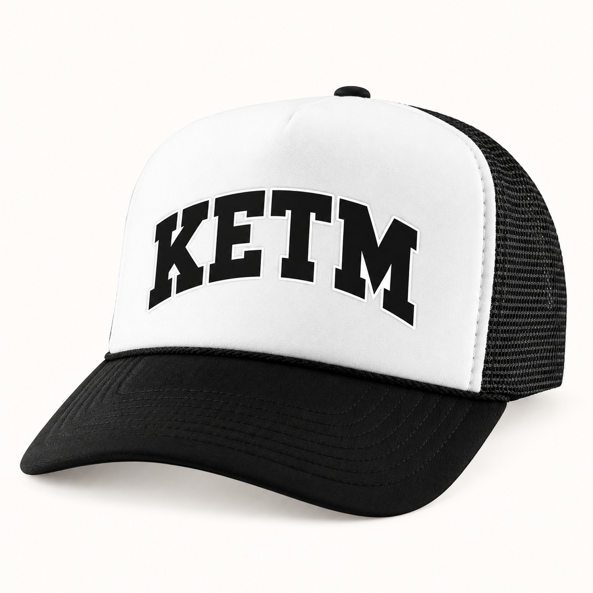 KETM foam-front trucker hat in Black White, arched DTF logo mockup