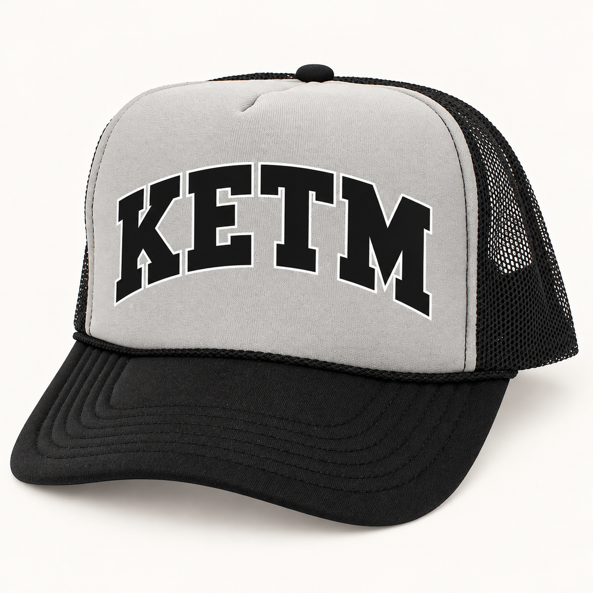 KETM foam-front trucker hat in Dark Grey Black, arched DTF logo mockup