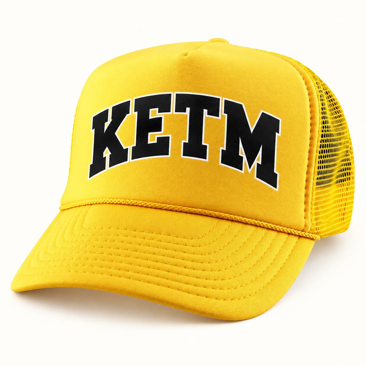KETM foam-front trucker hat in Gold, arched DTF logo mockup