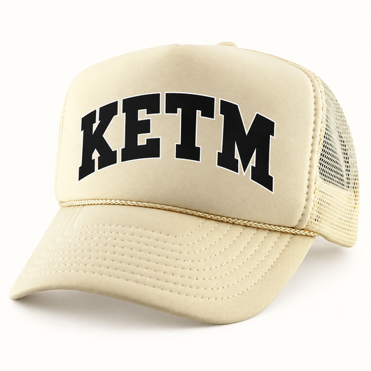 KETM foam-front trucker hat in Ivory, arched DTF logo mockup
