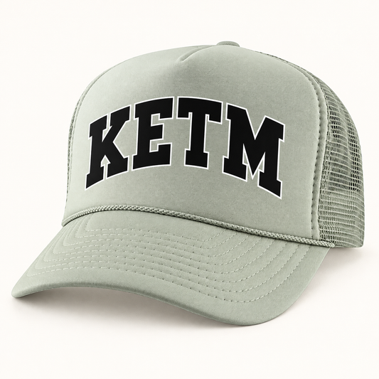 KETM foam-front trucker hat in Light Grey, arched DTF logo mockup