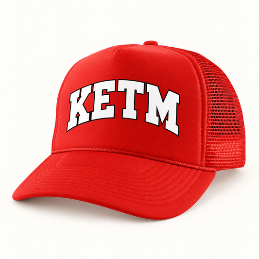 KETM foam-front trucker hat in Red, arched DTF logo mockup